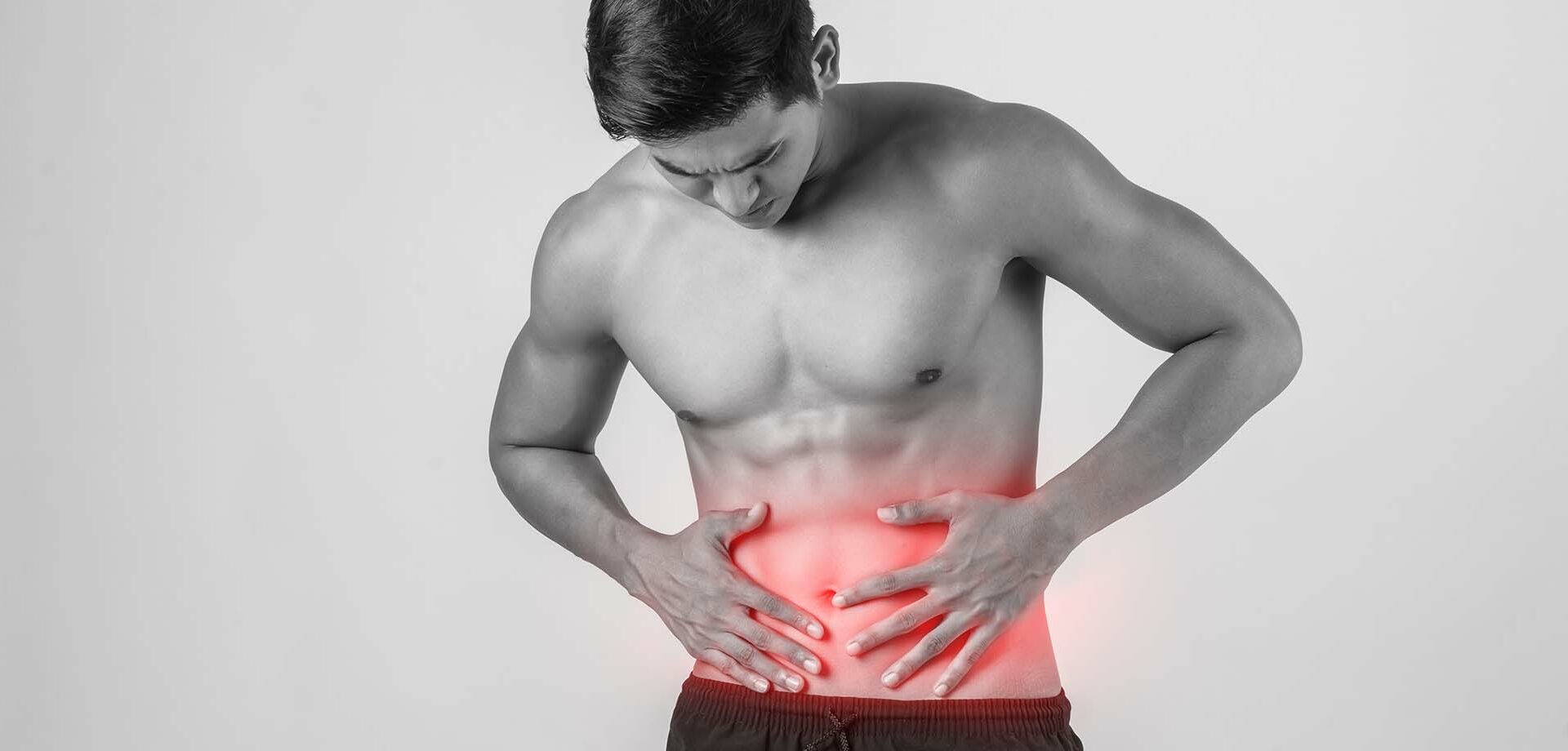 young-handsome-muscular-man-has-abdominal-pain-isolated-white-background