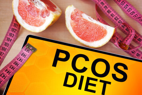 Tablet with PCOS diet. Weight loss concept.